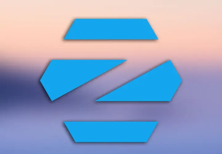 Niebieskie, geometryczne kształty na tle gradientu przypominającego zachód słońca. Logo Zorin OS, popularnego systemu linux.