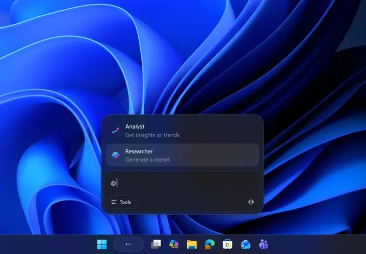 Przezroczysty pasek zadań Windows 11 z menu kontekstowym "Analyst" i "Researcher".