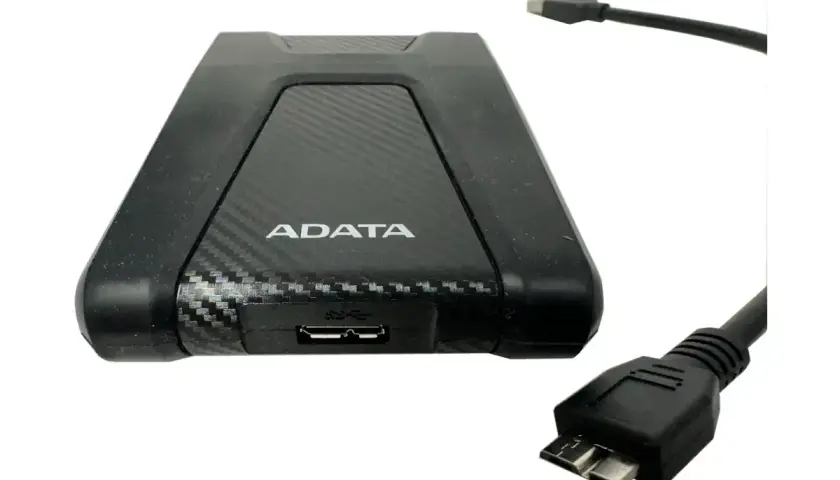 Dysk zewnętrzny HDD 1TB ADATA z kablem USB. Idealny do przechowywania danych.