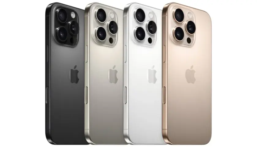 Cztery telefony iPhone 14 Pro w kolorach: grafitowym, srebrnym, białym i złotym, prezentujące potrójny system aparatów.