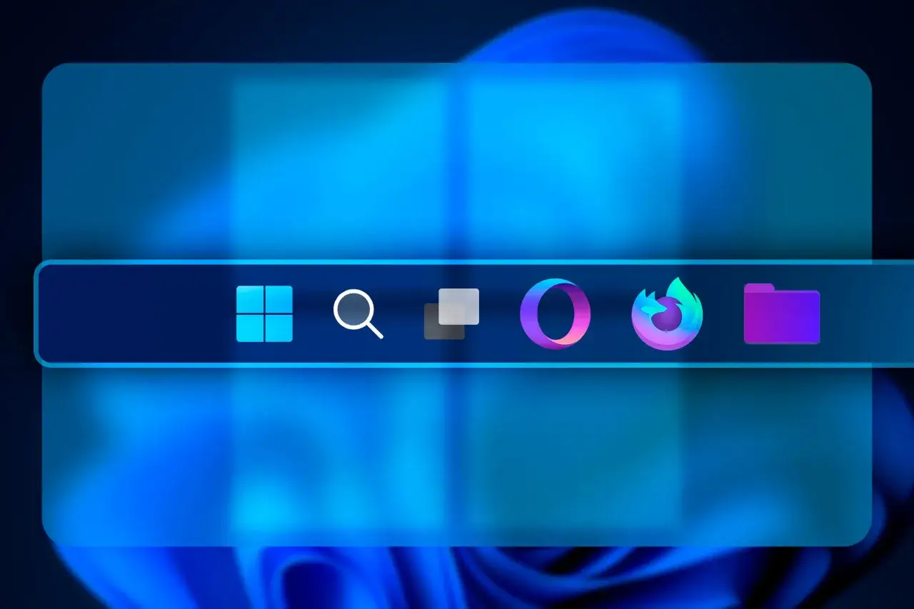 Przezroczysty pasek zadań Windows 11 z ikonami: Start, wyszukiwanie, okna, przeglądarka i folder.